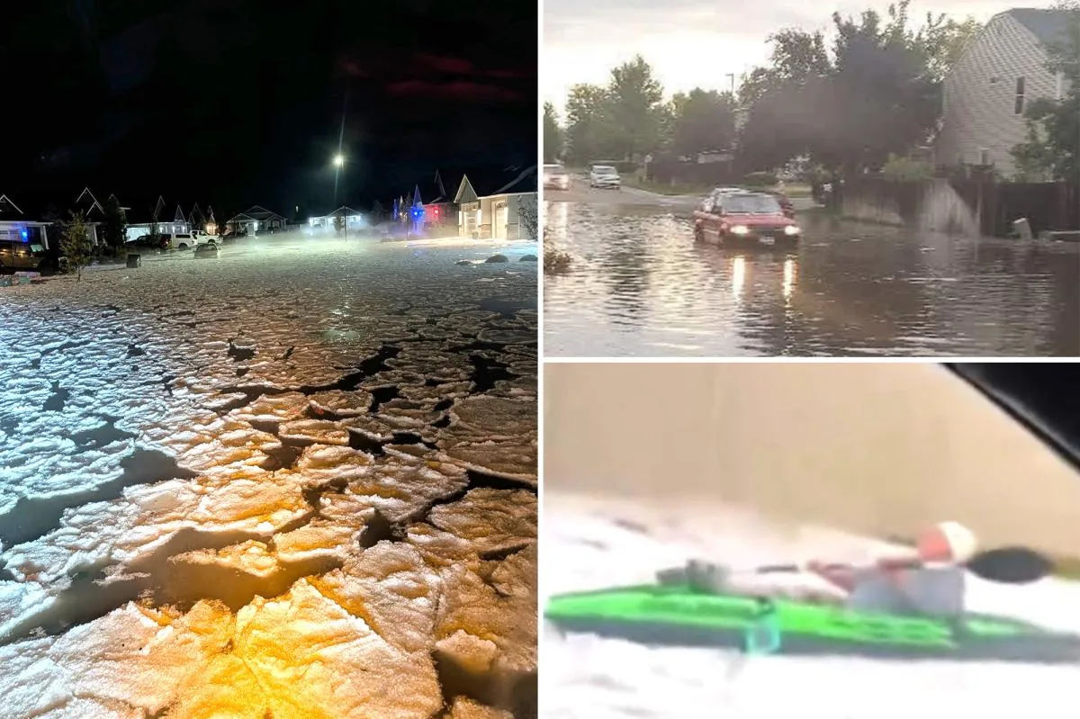 Floodwater and hail cover a suburban Boise road as a kayak is paddled through the street